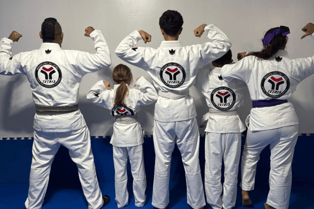 Kids practicing takedown balance drills at Tetris Jiu-Jitsu in Orlando, FL, building confidence.